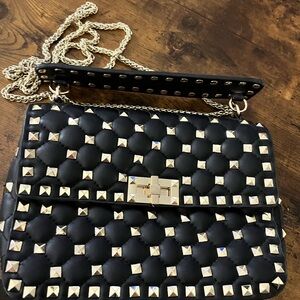 Black studded handbag